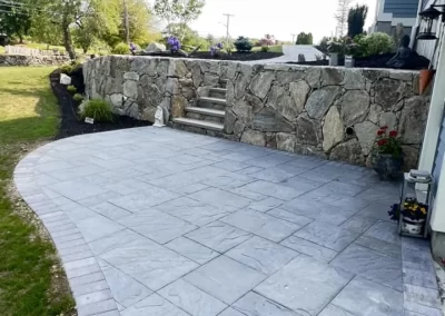 Completed patio installation Johnston RI by Reyes Landscaping