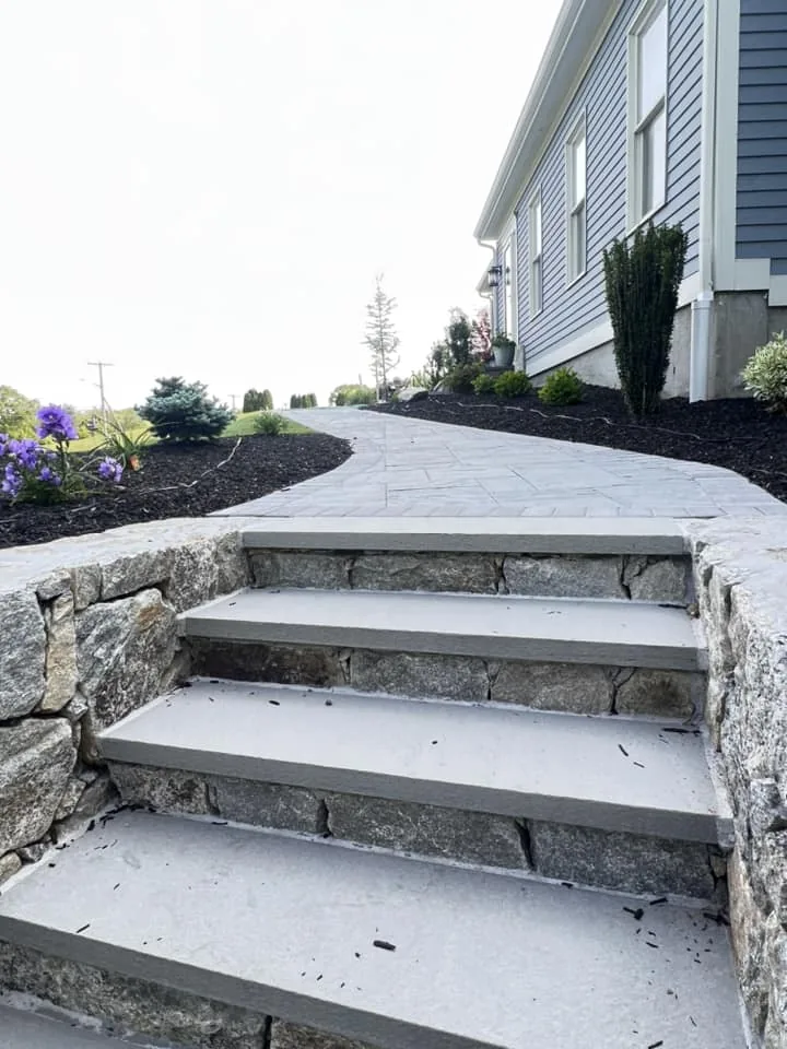 Paver walkway and stone steps close-up — Reyes Landscaping project in Johnston, RI